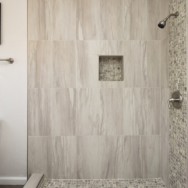 Open up the space with bathroom remodeling.
