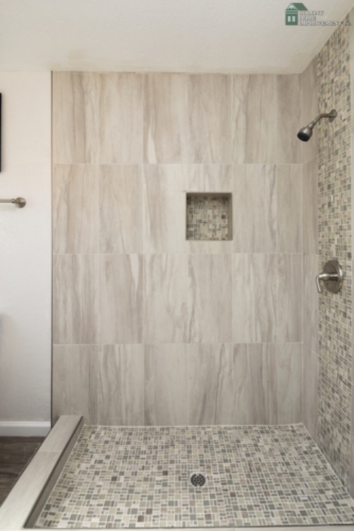Open up the space with bathroom remodeling.