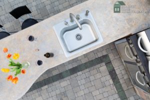 Design an outdoor kitchen with the help of remodeling services.