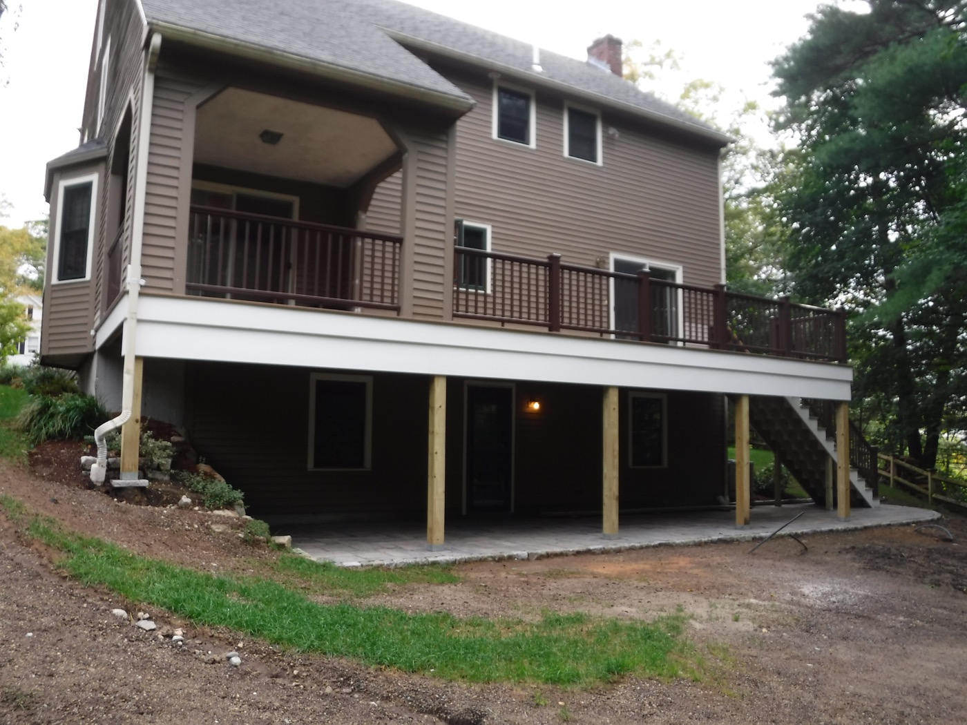 Deck and exterior home remodel under construction in Massachusetts