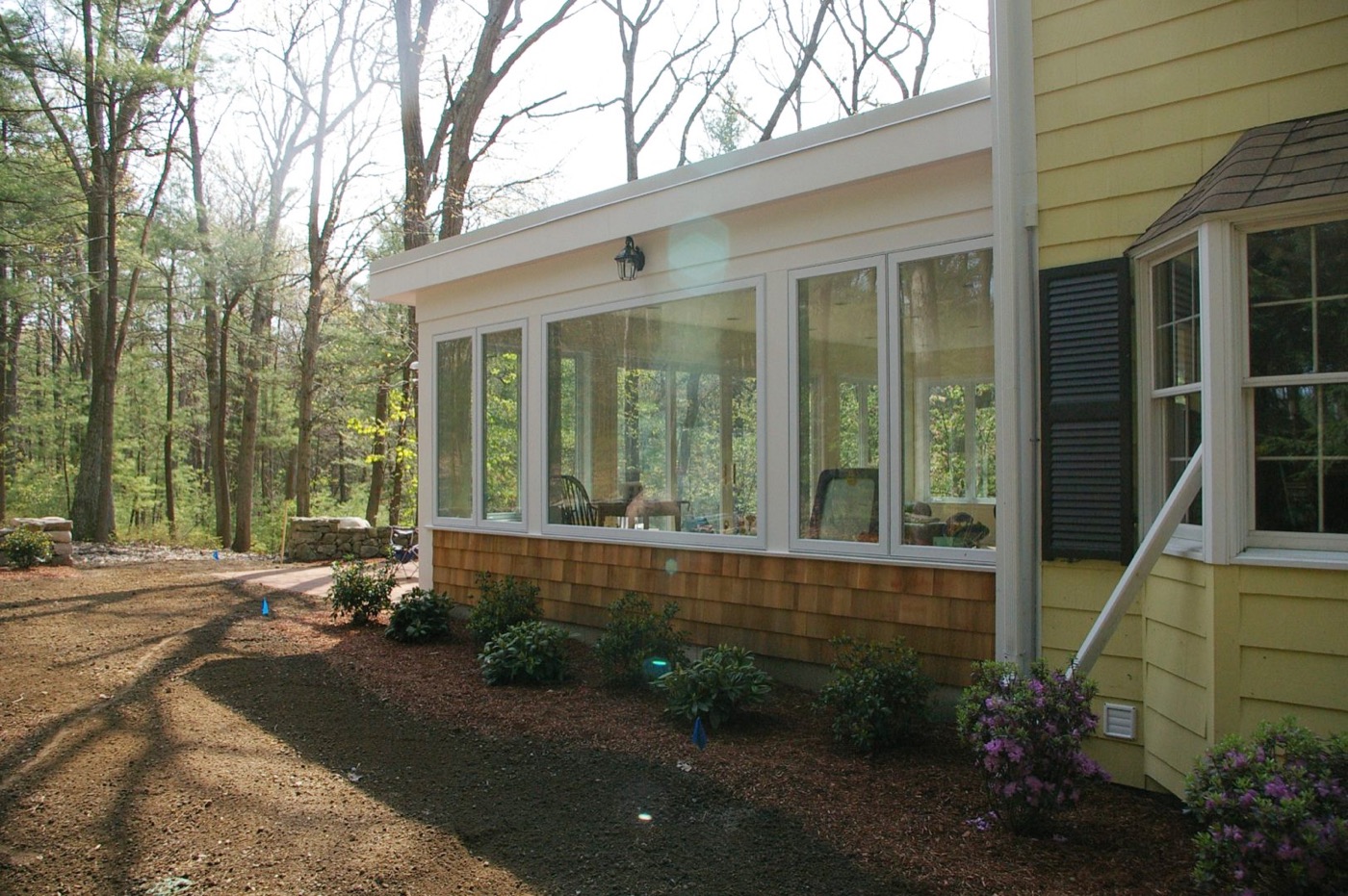 Completed sunroom home addition on a Massachusetts house